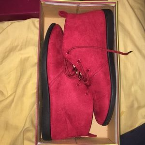 Red faux suede round toed lace up desert booties.